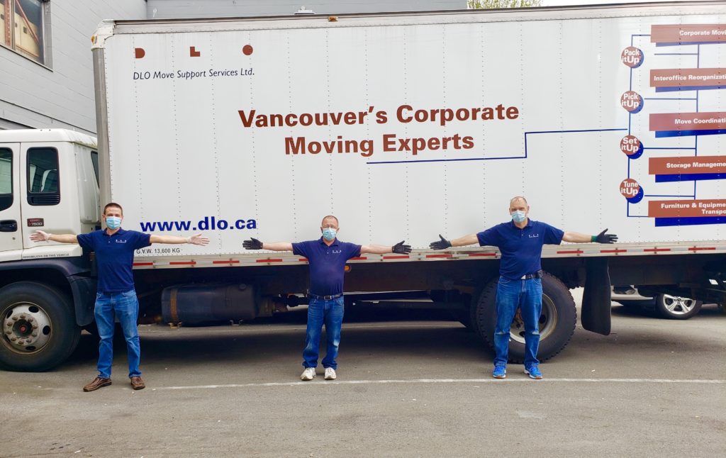 DLO office moving experts - DLO team social distancing in front of truck